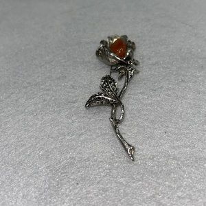 silver and amber rose brooch